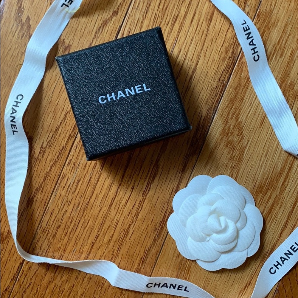 Chanel jewelry box with ribbon and flower